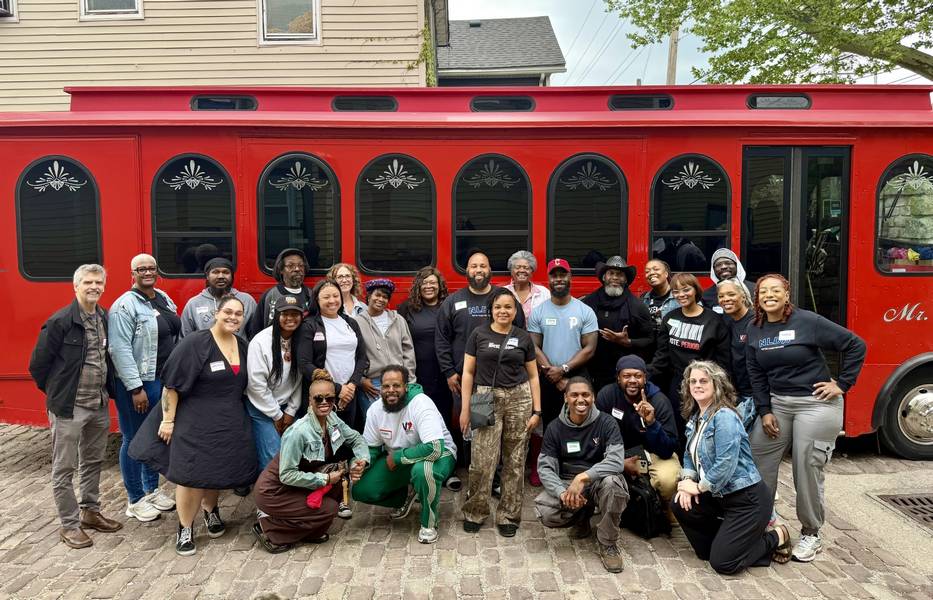 Cohort members take the neighborhood tour.